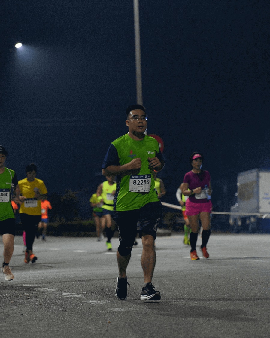 Thanh running his first half marathon at night